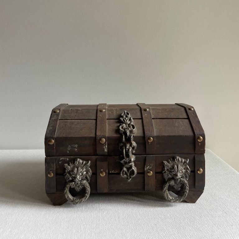 Wooden box with lion knockers