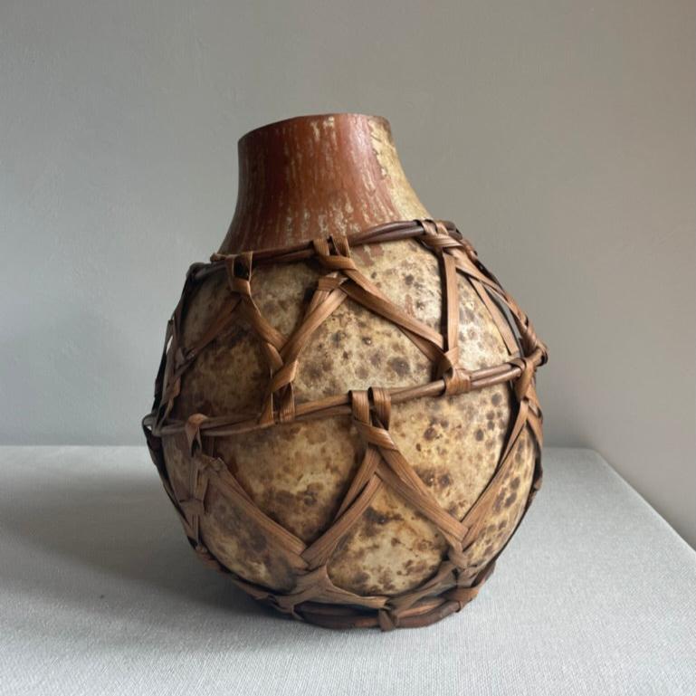 Mexican rafia wrapped gourde vessel