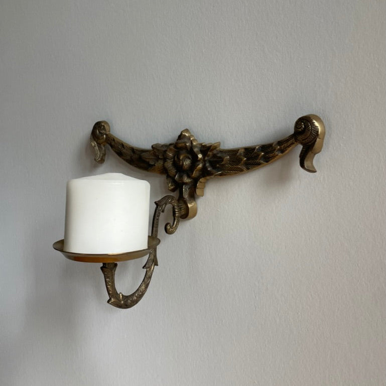 Bronze candle holder with flower detail