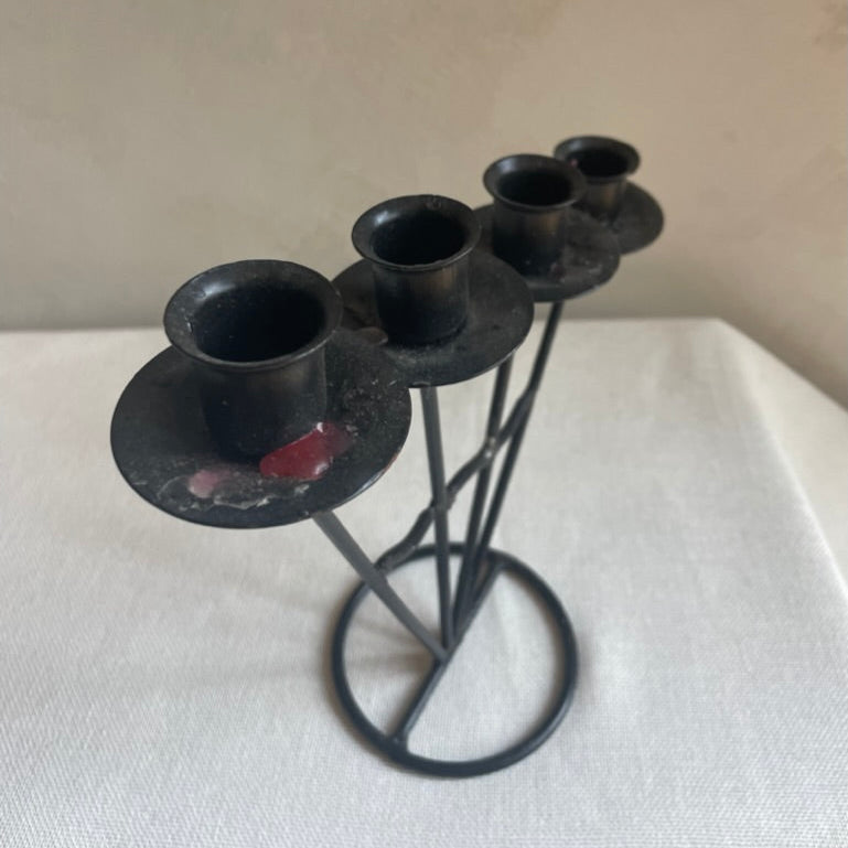 Metal triangular candle holder