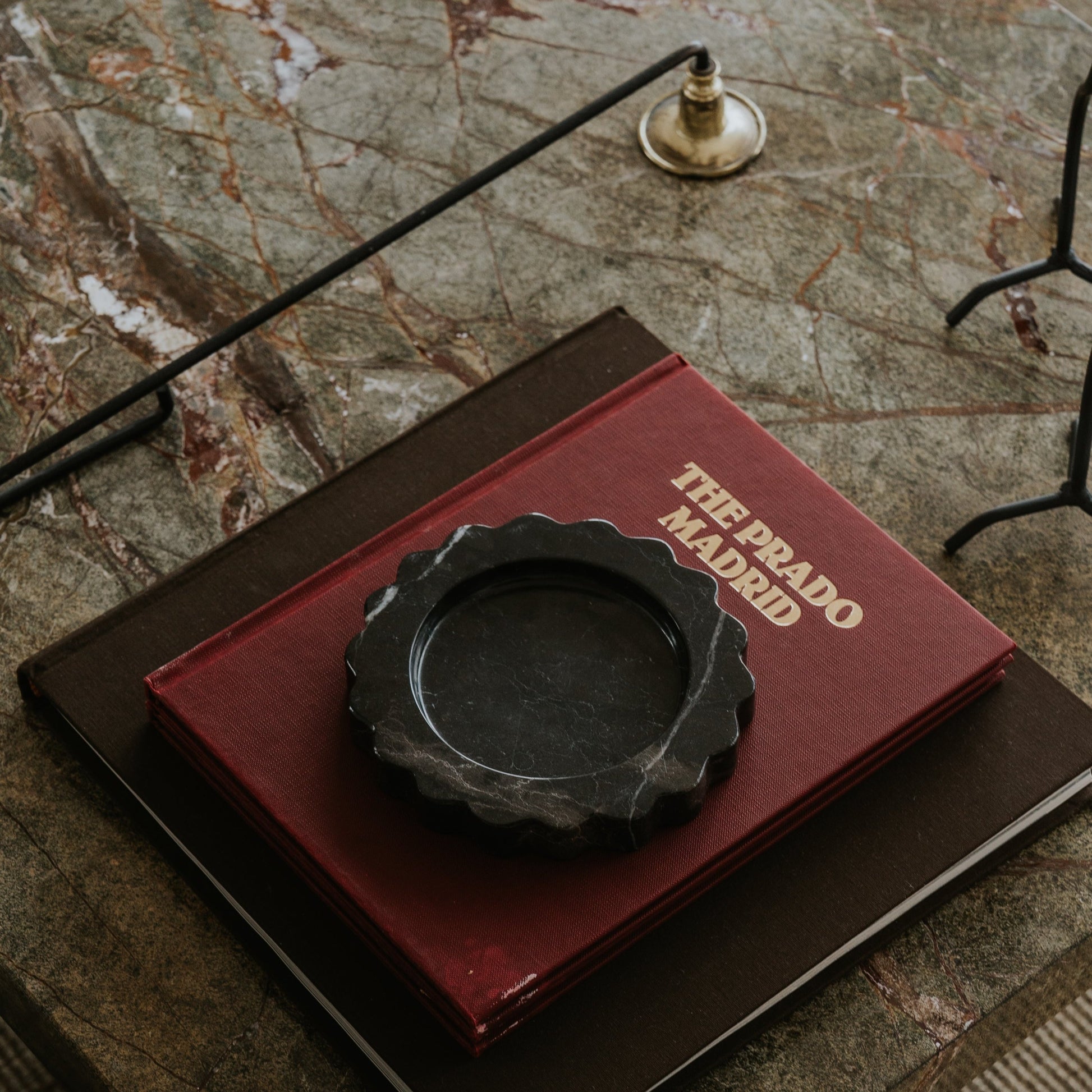 floral-inspired stone catchall tray styled on coffee table