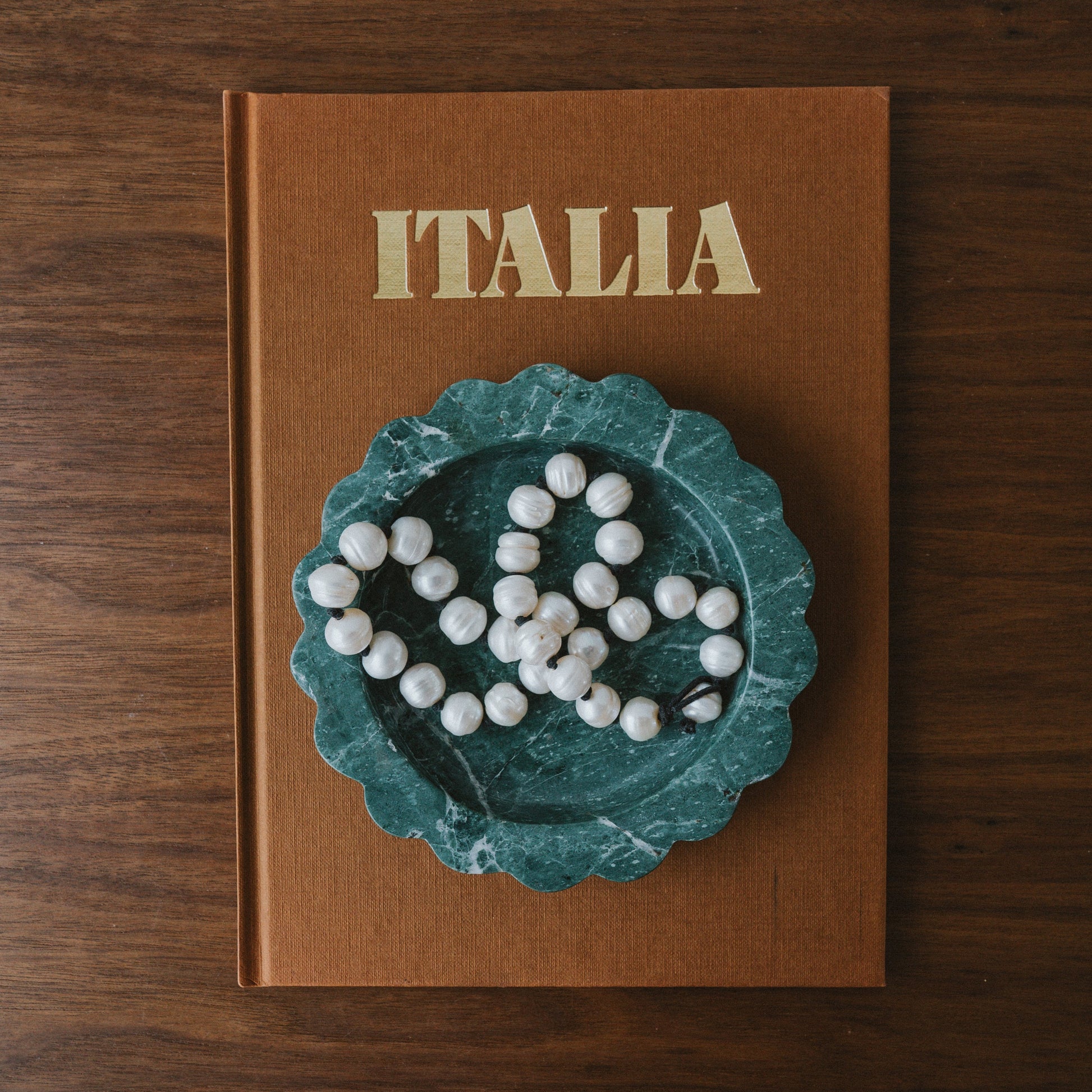 decorative marble valet tray with jewelry and keys