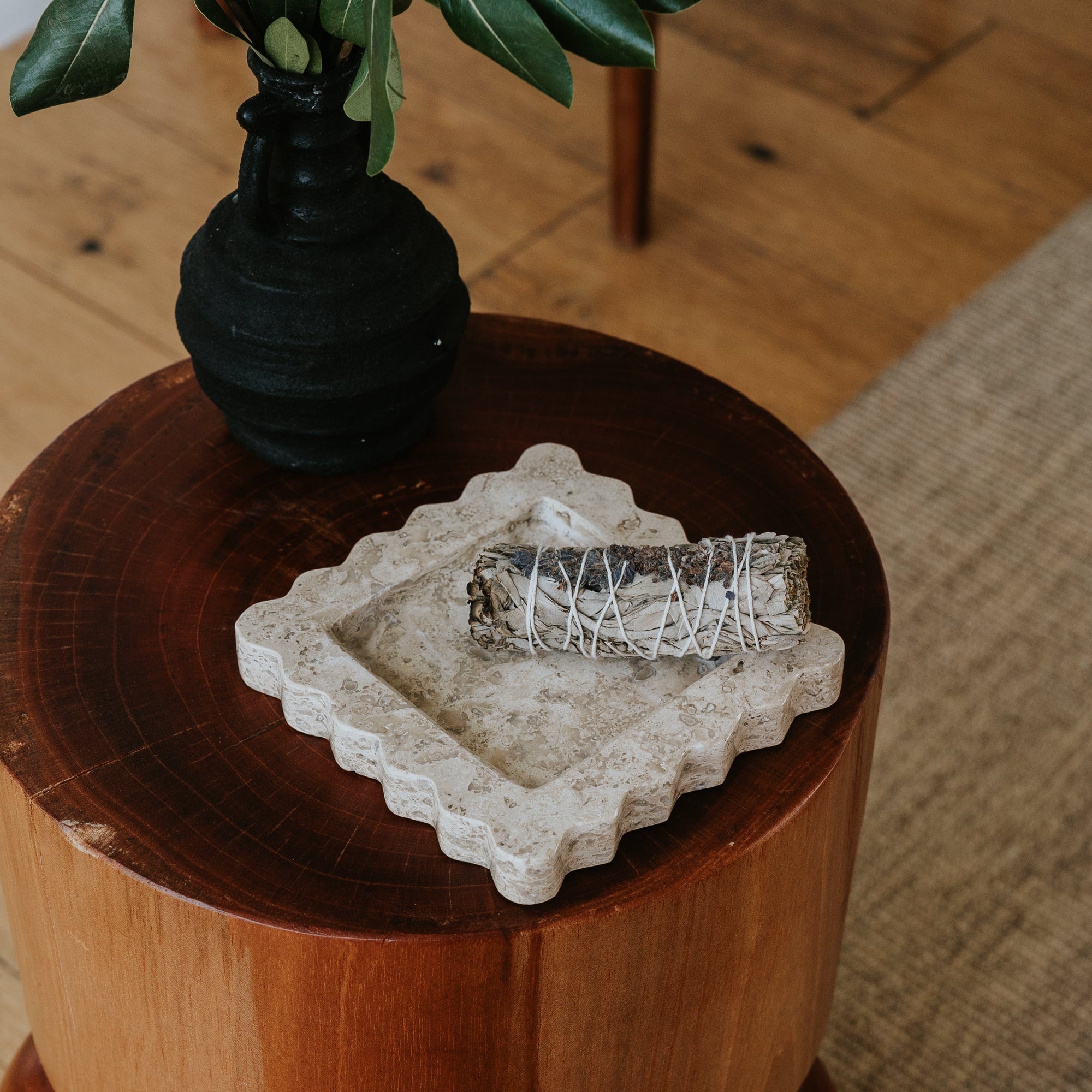 sculptural marble catchall tray with scalloped edges