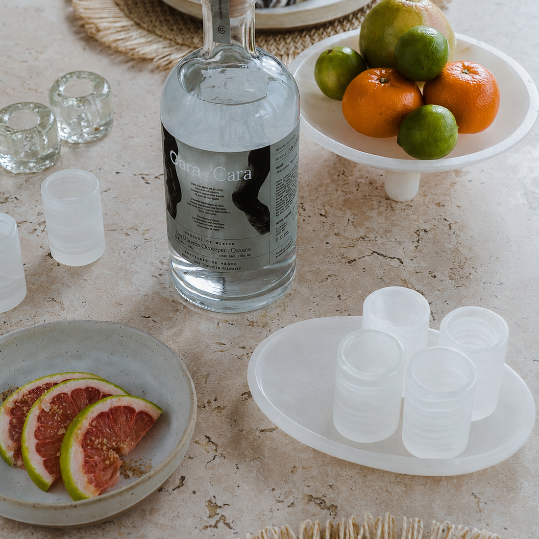 serving tequila in white onyx shot glass