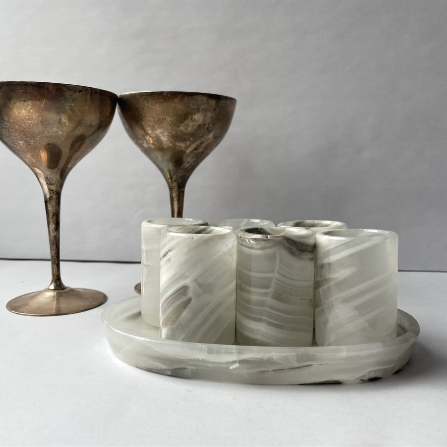 grey onyx stone shot glasses on tray with bar glasses