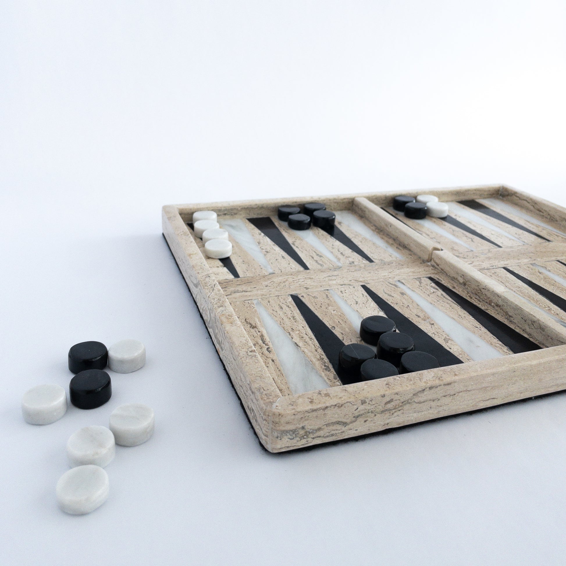 close-up of natural stone backgammon playing pieces