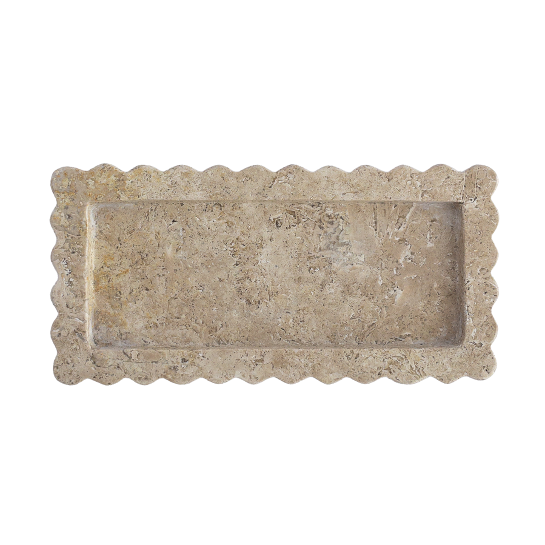 close up of natural travertine tray with unique veining